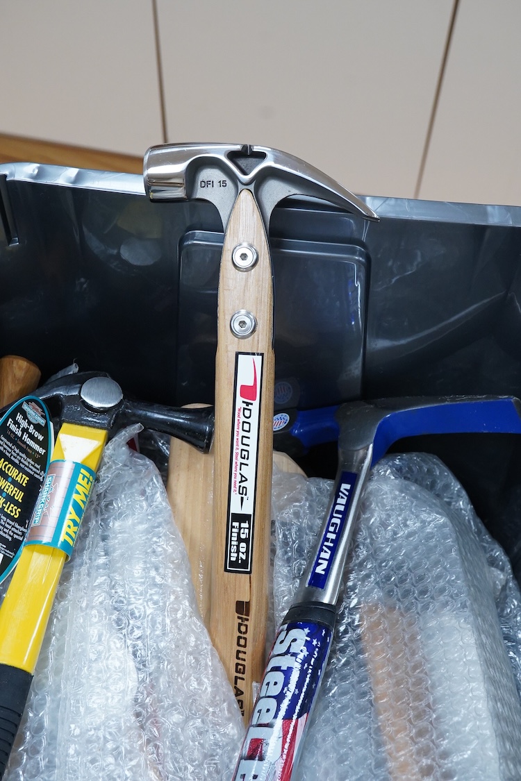 A collection of heavy duty hammers, framing hammers, and axes, including; 13 hammers by Vaughan, U.S.A., plus nine others by Stiletto, etc., and 14 carpenters axes and hatchets by James Howarth, Gransfars Bruks, Agdor of